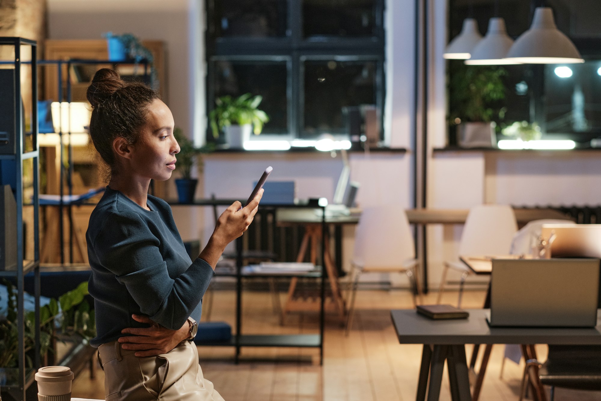 Attractive businesswoman with smartphone